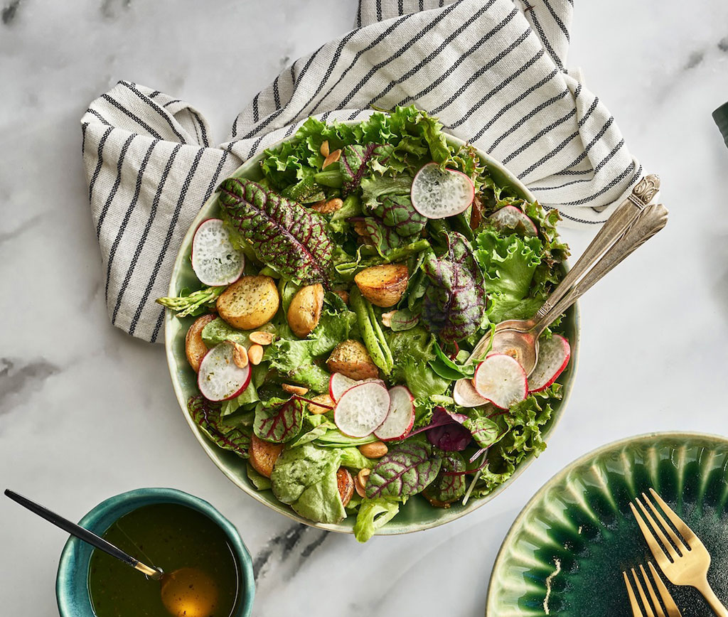 Leafy salad and grilled potatoes